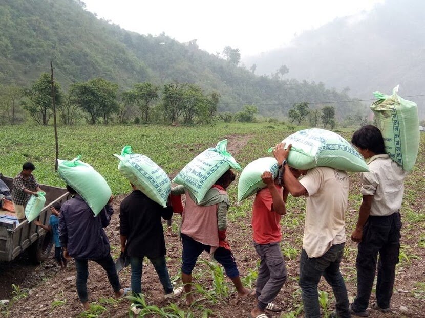 Carrying food to people Nepal.jpg