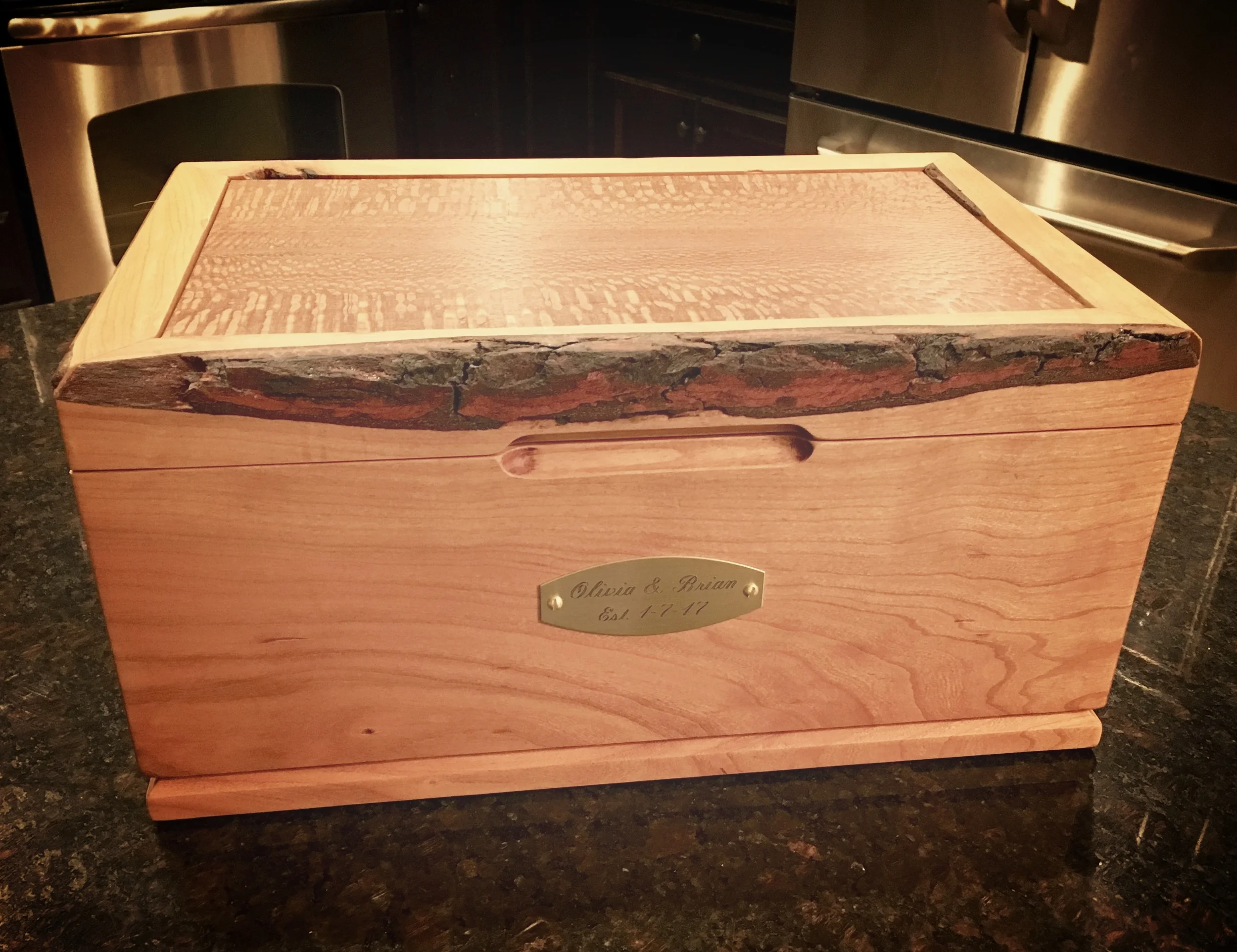Incorporation of exotic woods (top) and the wood's natural elements (bark)