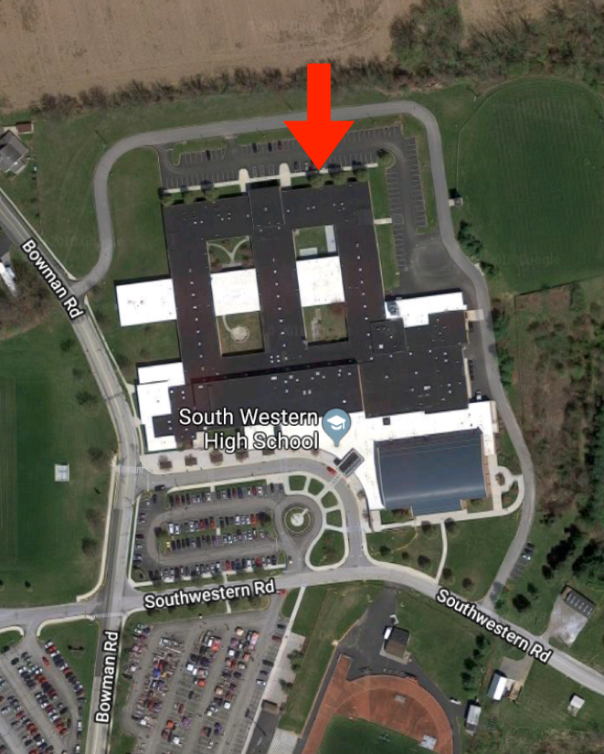 Note: The tailgate will take place on the north side of the school (indicated by the arrow).