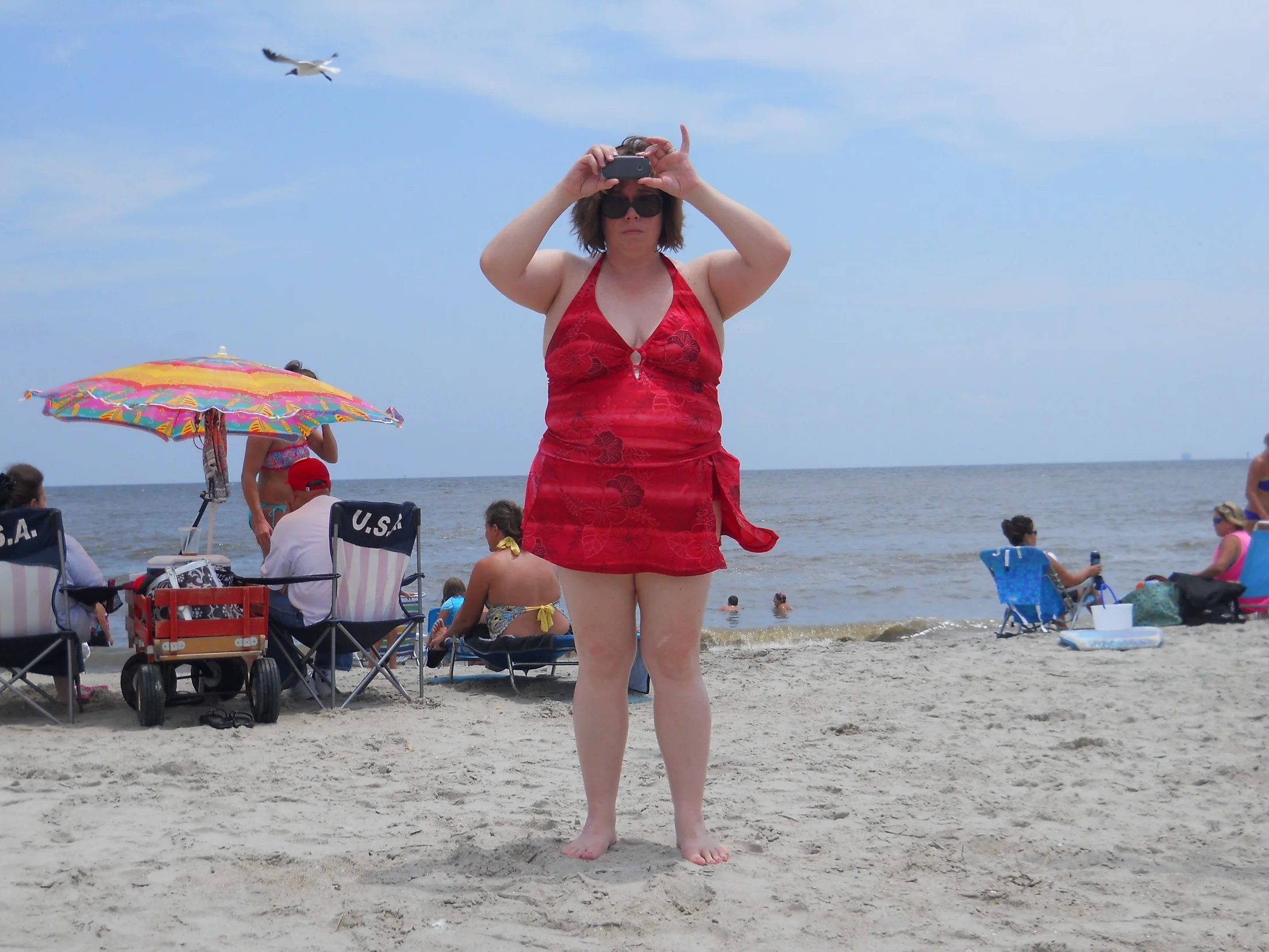 A rare moment in just the Cancer Tankini, without the swim shirt. Why am I taking a picture of someone taking a picture of me? God only knows. Even the bird is repelled by the irony.