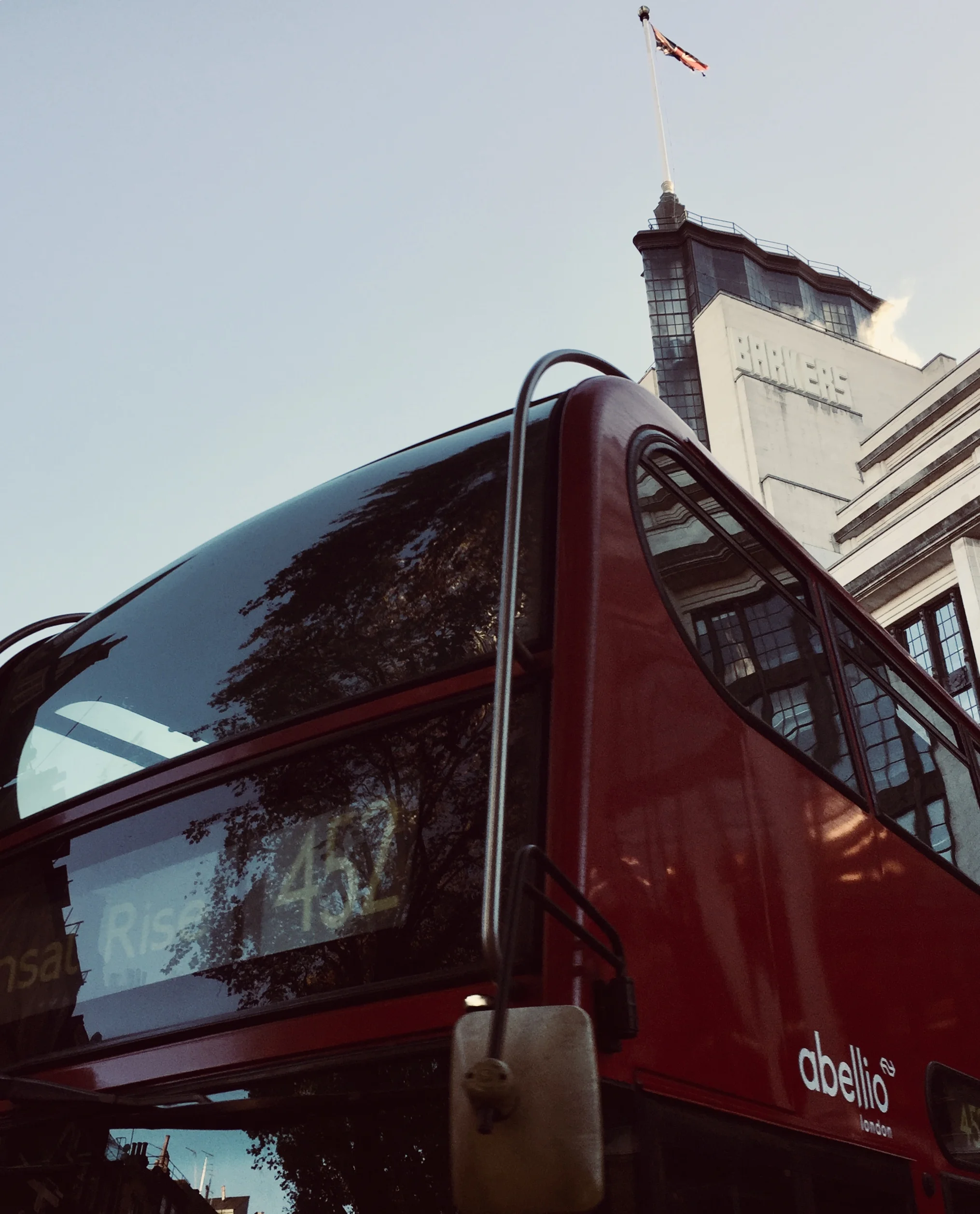 red London bus with the Barkers building in background.jpg