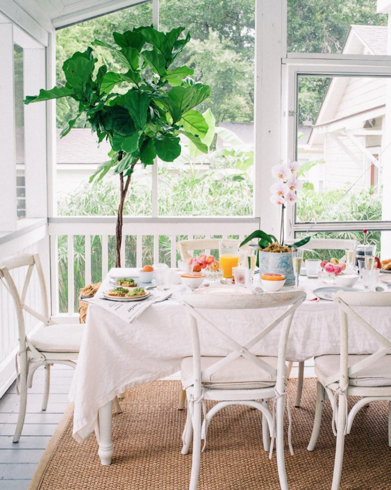 Bright white cheery breakfast nook, via Lucy Cunero.