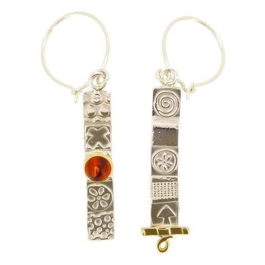 LONG ASYMMETRICAL SILVER EARRINGS.png