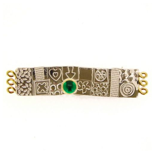LONG ASYMMETRICAL SILVER BROOCH.png