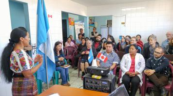 A nurse talks to the Canadian exchange participants