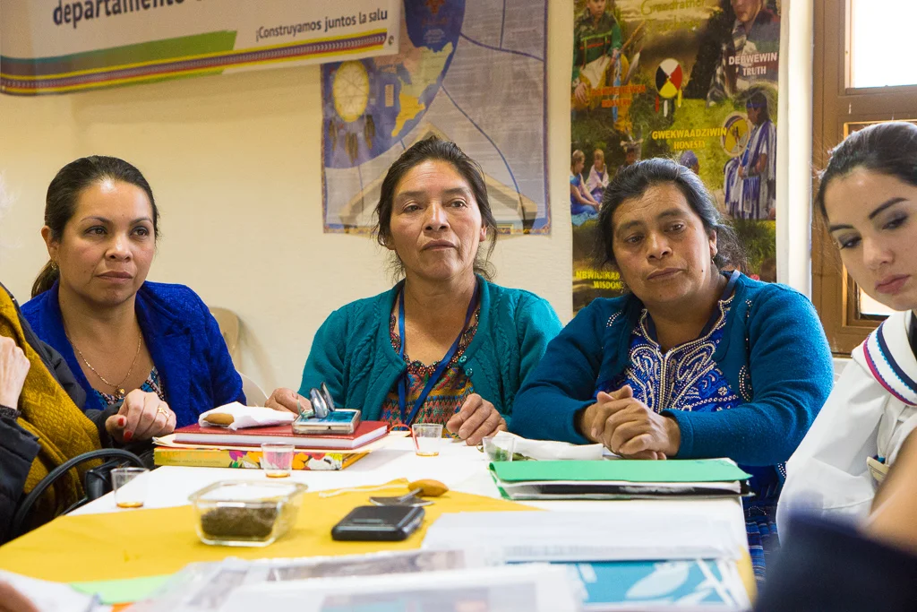 (Left to Right) Juana Maria, a Totonicapán Health Directorate representative joins traditional Indigenous midwives Angela Perez and Maria Batz, alongside Inuit midwife Cas Connelly, in discussing the situation of Indigenous Maya K'iche' and Inuit women and children in Totonicapán and Nunavut