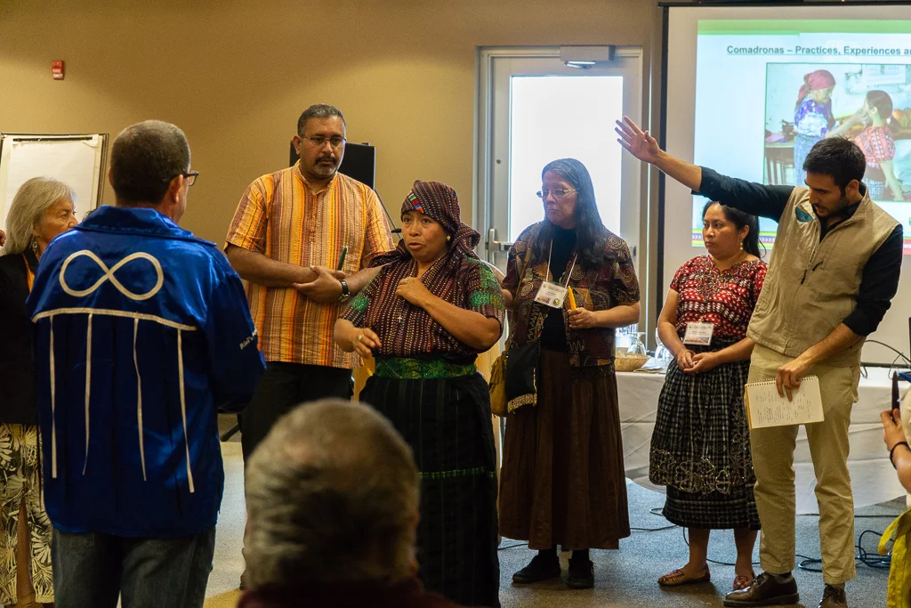 OPSEU members alongside Wikwimekong Elders and community leaders listened closely to Antonia's prayer.
