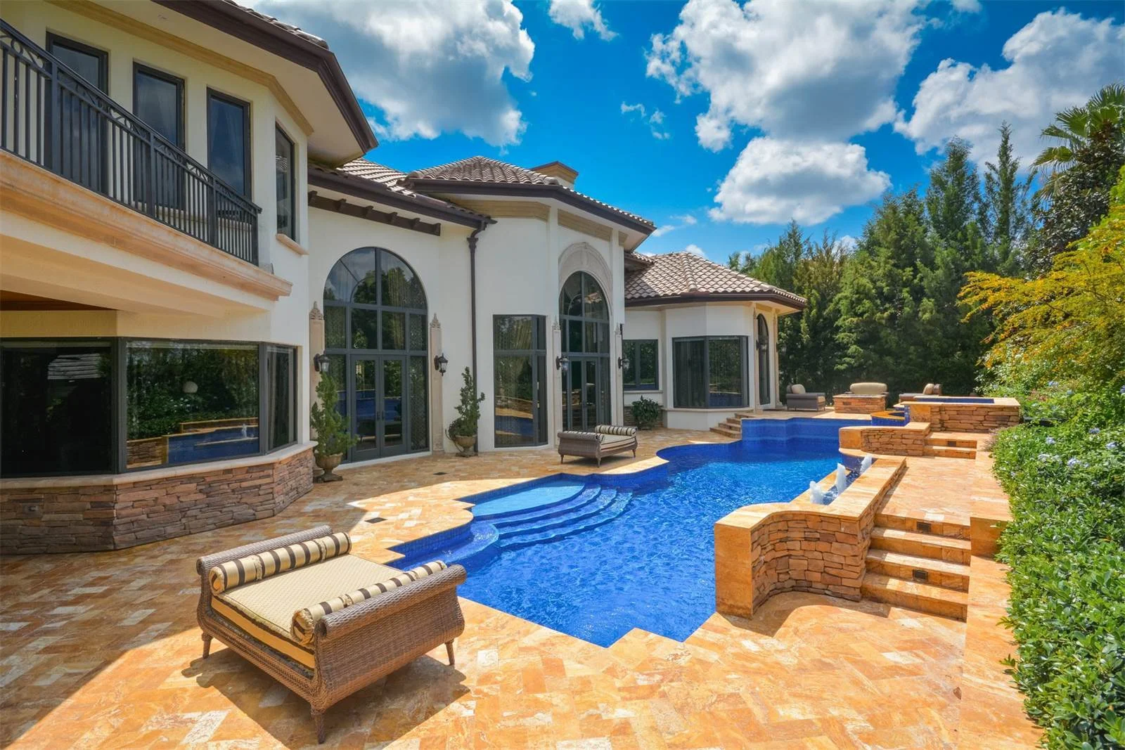custom-backyard-beautiful-pool-tanning-entertaining.jpeg