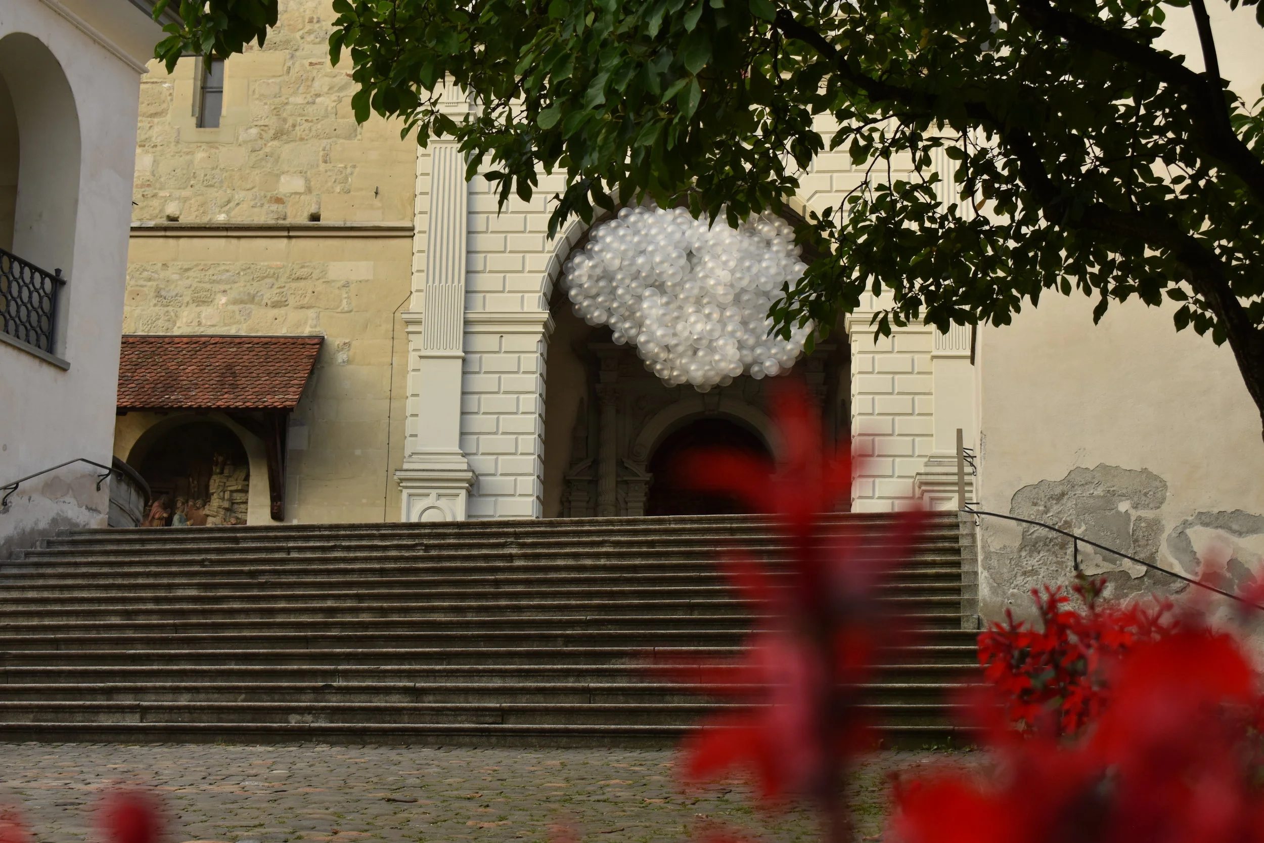 tower behind flowers