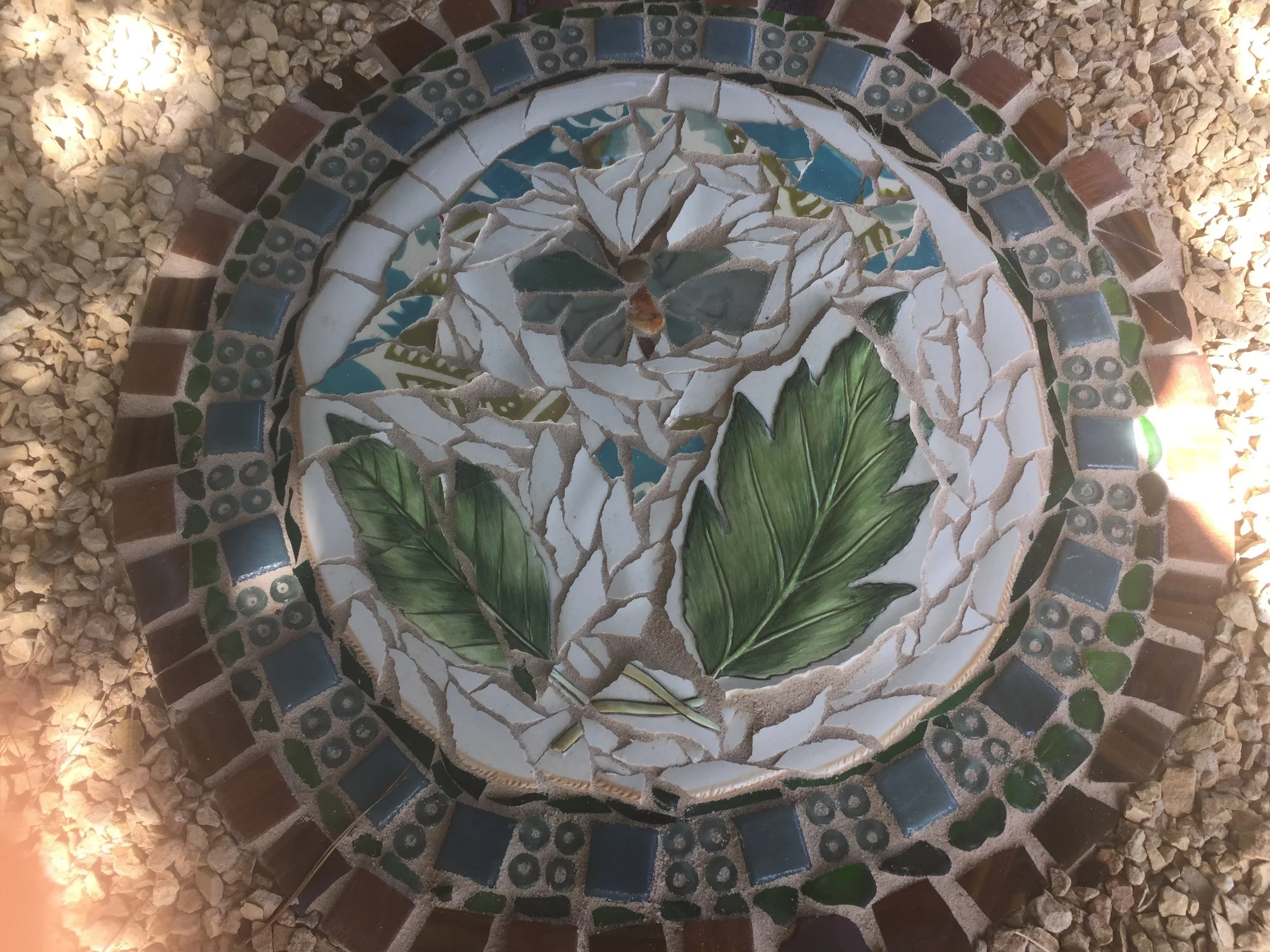  I found this plate in a thrift shop. I used lots of sea glass and sea glass necklace that I never wore!&nbsp; 