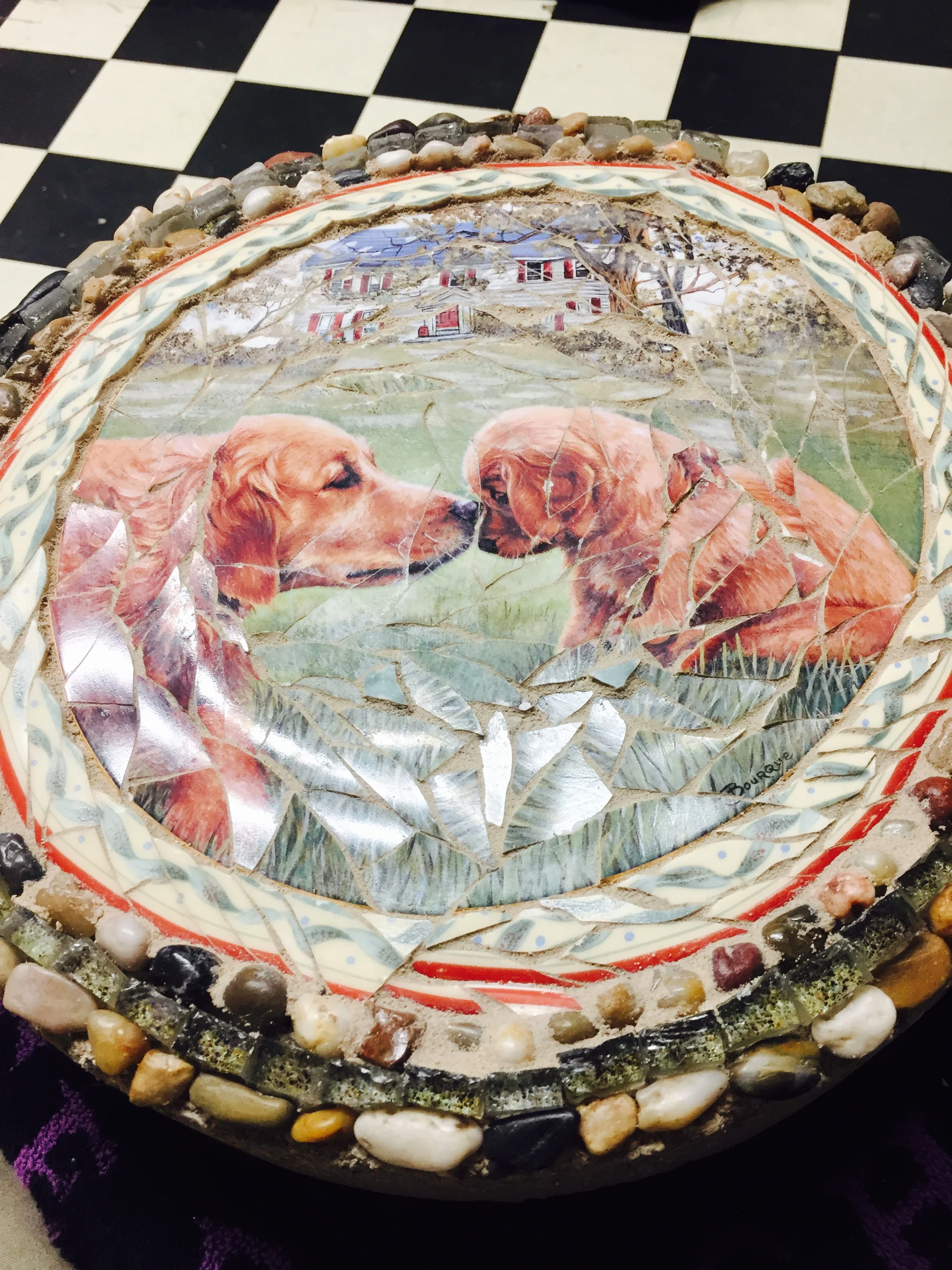  I made this stepping stone called "Golden Moments" for a silent auction. I didn't grout the outside rocks and glass tile so the true colors could shine through.&nbsp; 