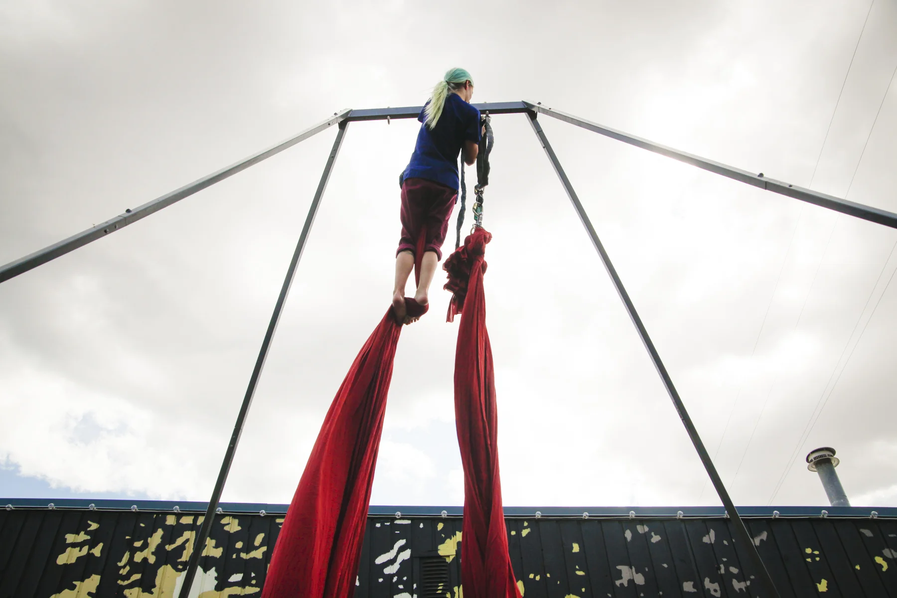 Setting up for the aerial silks performance. Photo credit - Amanda Guy Photography