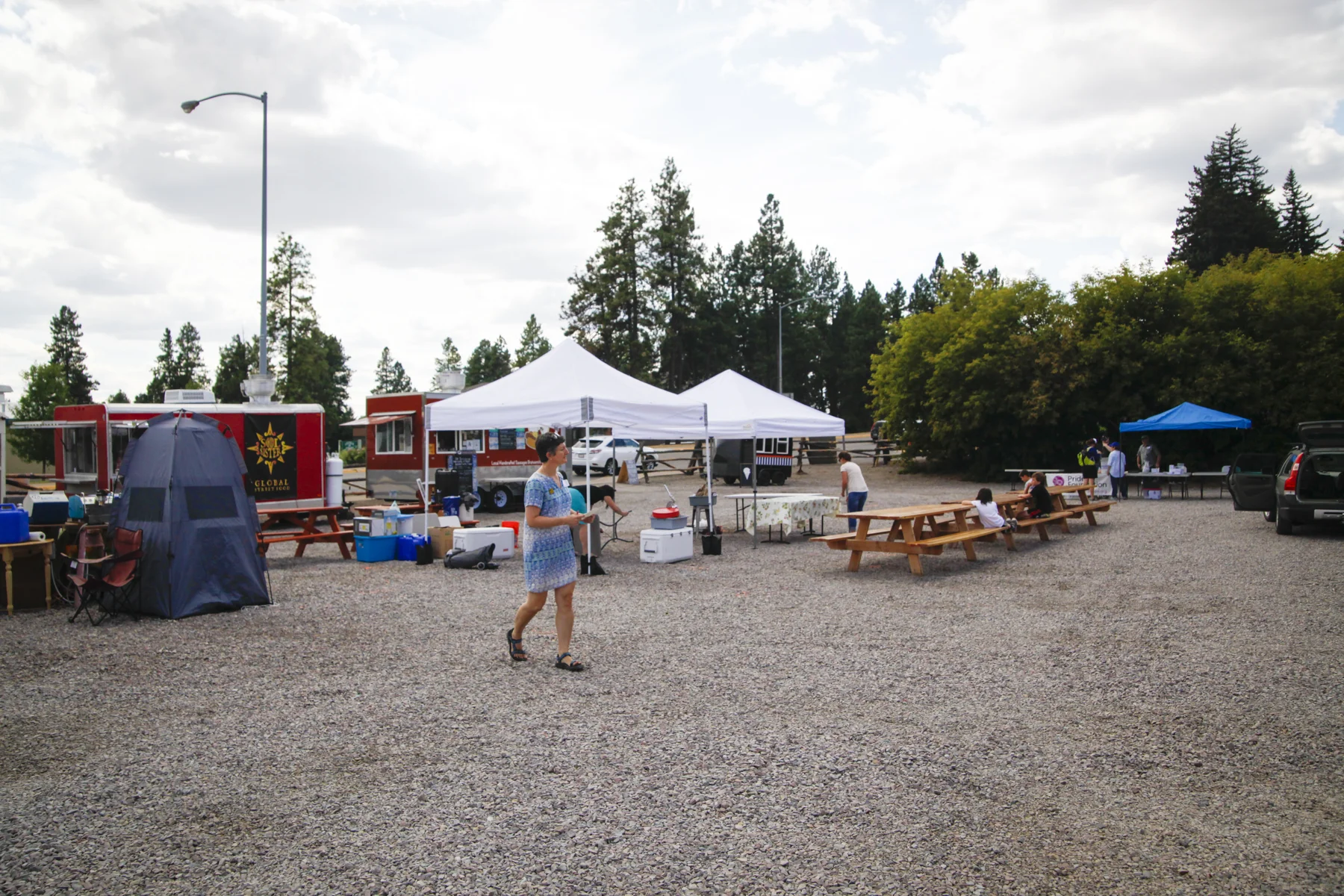 Rabbi Francine Roston helps to coordinate the set up of information booths, activities and food trucks. Photo credit - Amanda Guy Photography