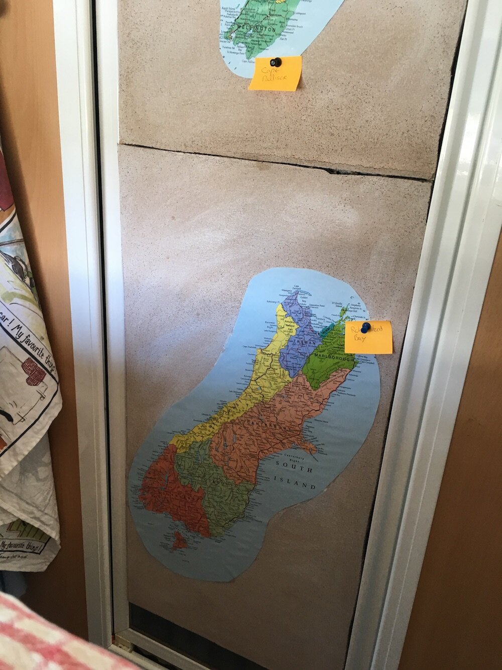  The map is glued on a cork board 
