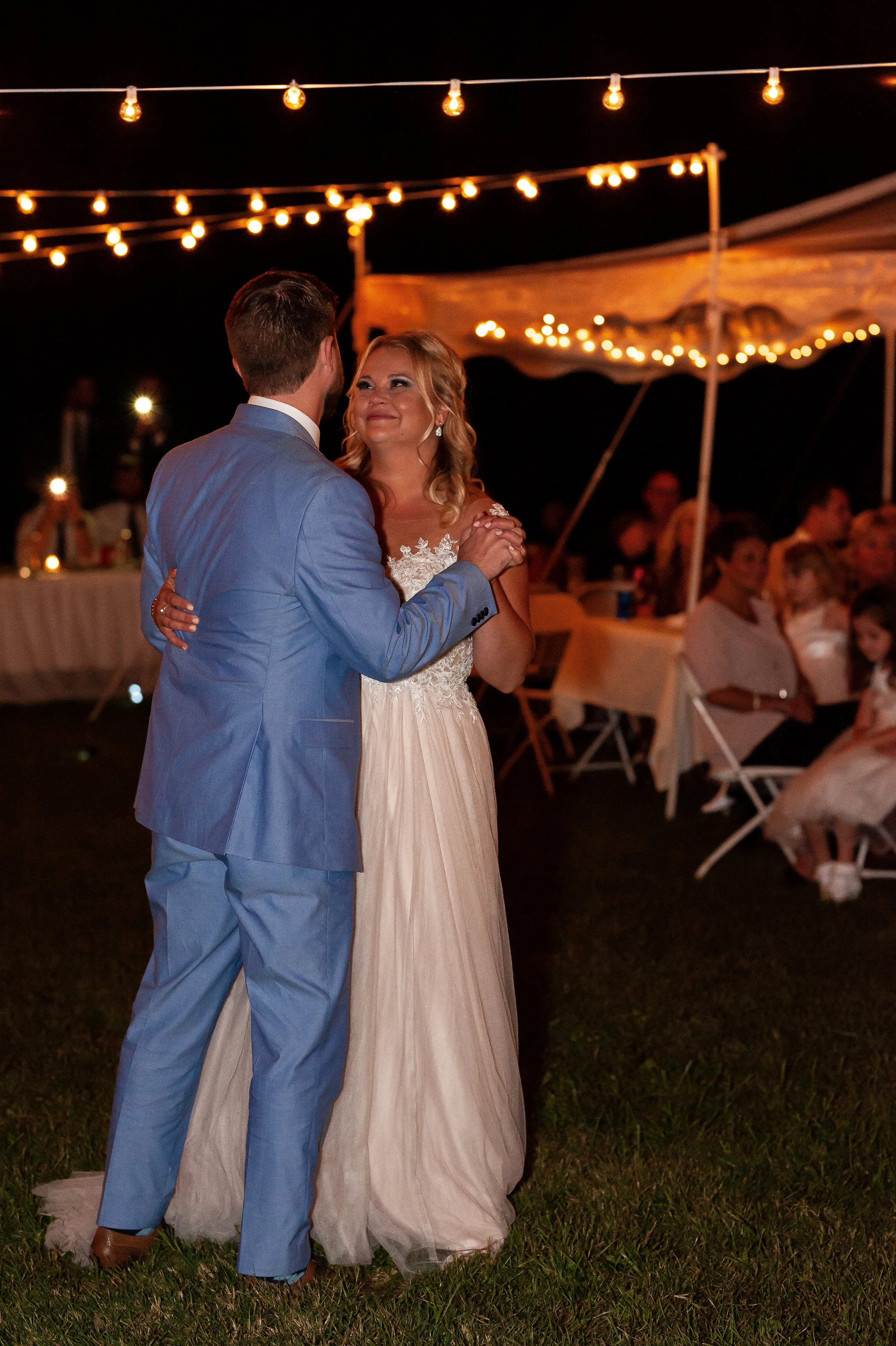 The couple then moved onto their first dance and father-daughter/mother-son dances