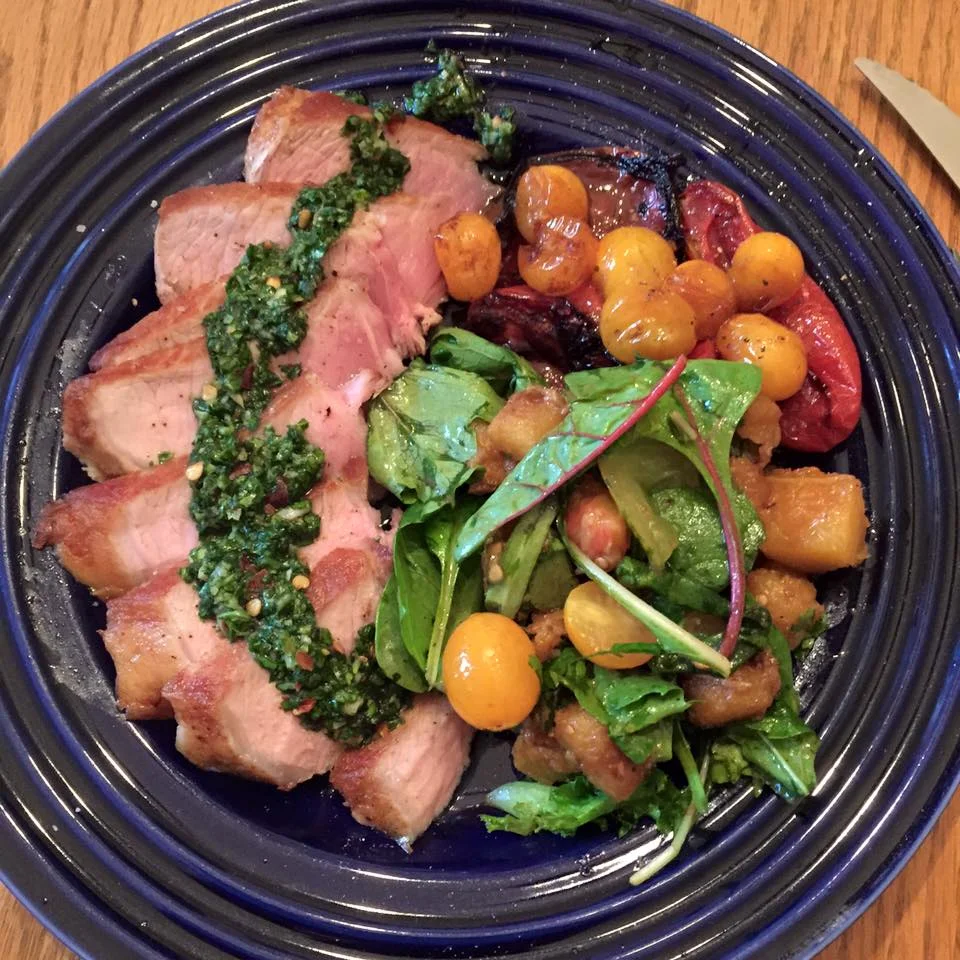 pork chops, basil chimichurri, acorn squash, charred tomatoes.jpg