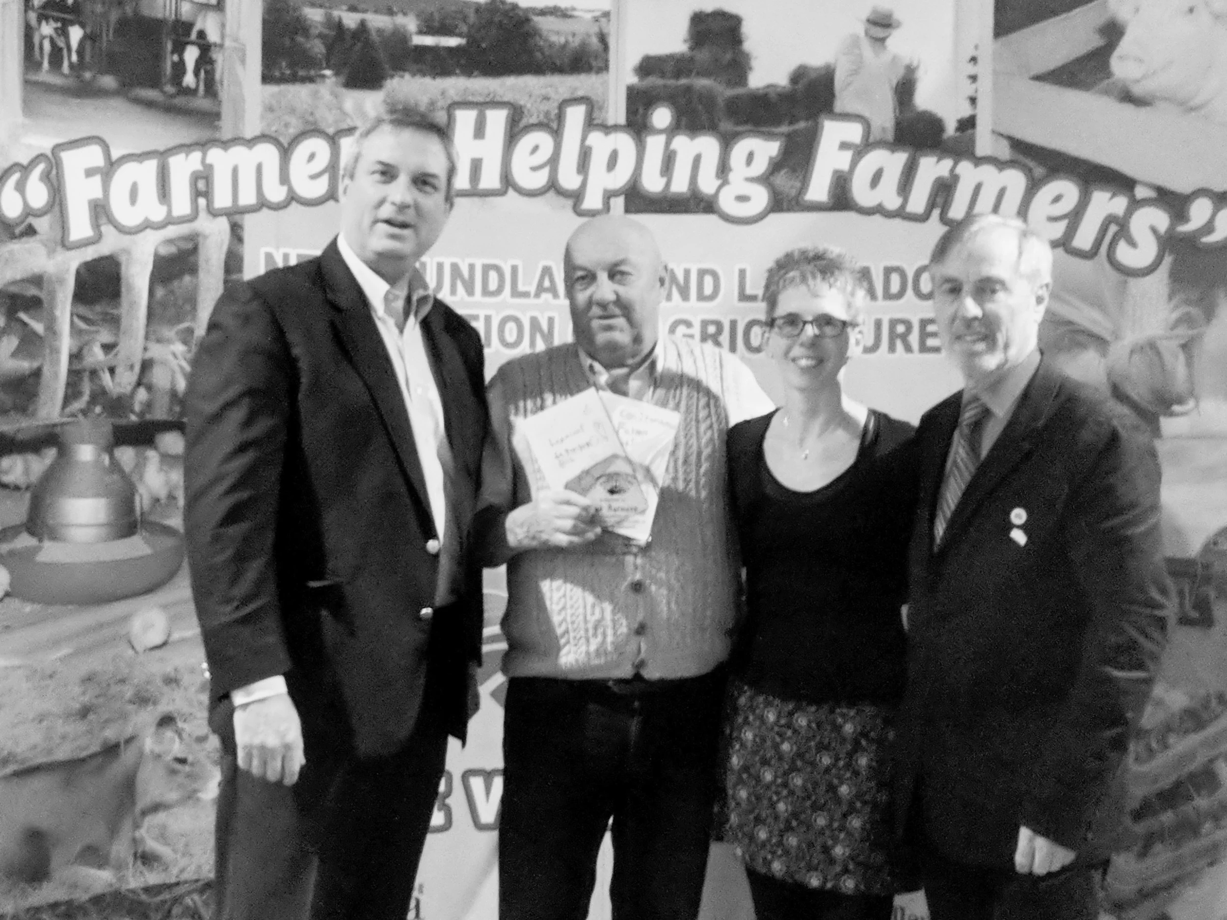 Bob Aylward received the NLFA’s lifetime achievement award. From left, Fisheries and Land Resources Minister Gerry Byrne, Aylward, Nancy Ryan (a teacher at the school where Aylward mentors), and NLFA president Merv Wiseman. (Submitted photo)