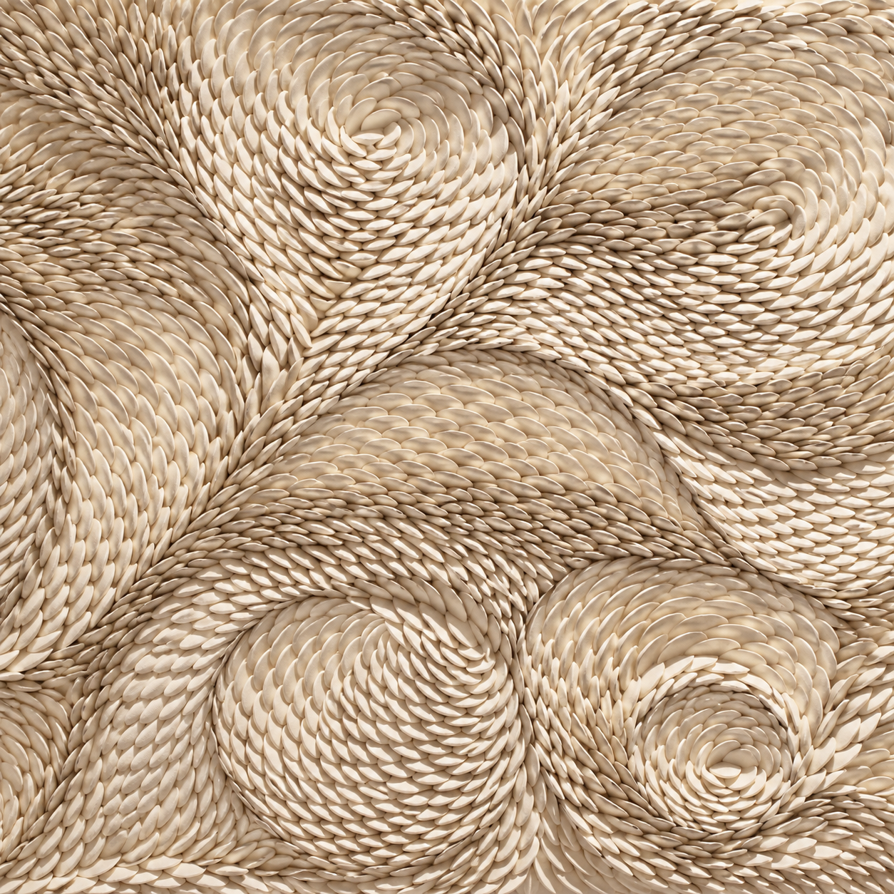 Ivory ceramic spirals in relief.png