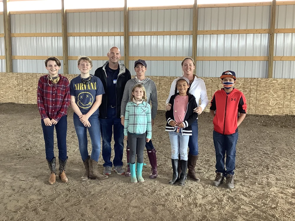 A family group together in the arena