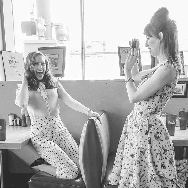 INT. DINER-DAY
Empty plates and Coca-Cola cups pile on the table, evidence of a well prepared meal. One girl throws down a few dollars as a tip while the other reaches for her camera. 📷📸📷📸📷📸
My face when I see the waitress walk out with the sam