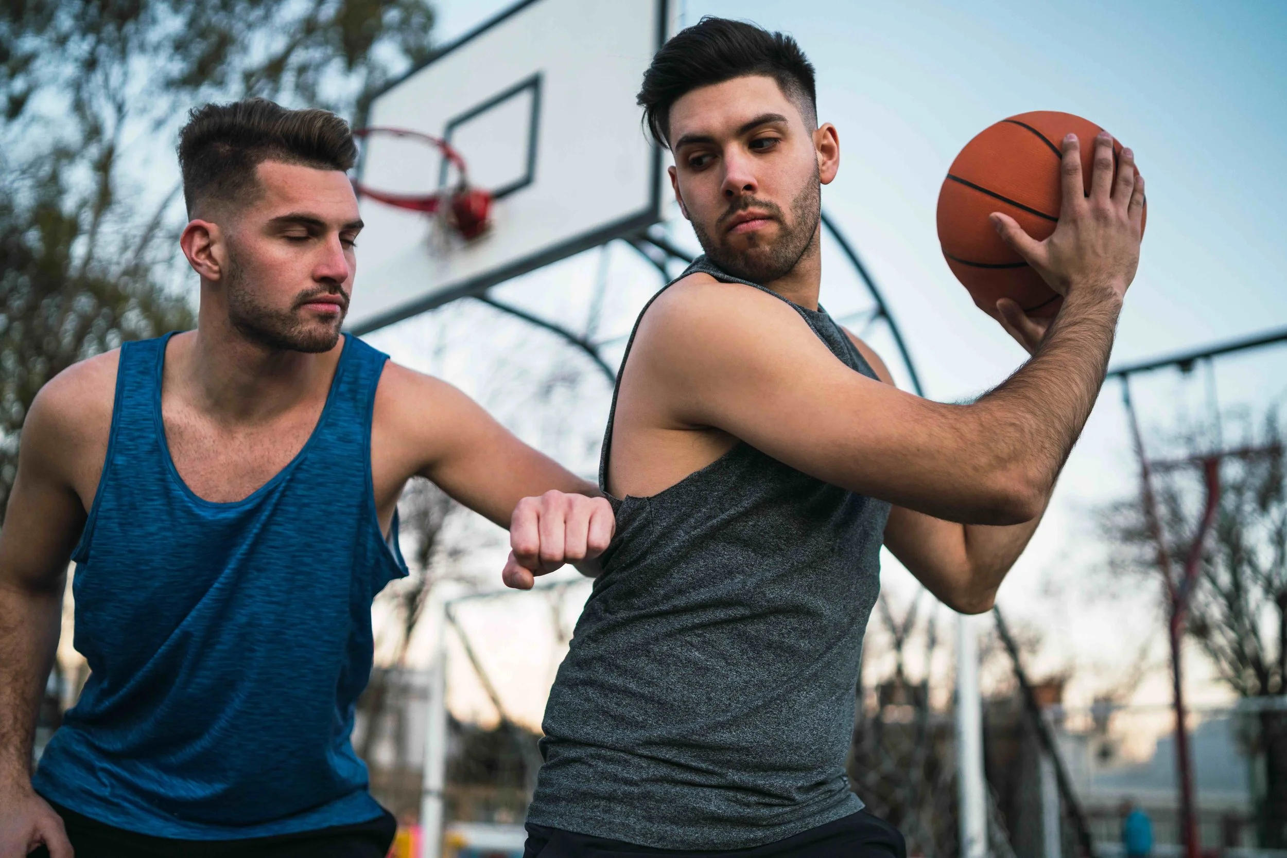 portrait-two-young-friends-playing-basketball-having-fun-court-outdoors-sports-concept.jpeg