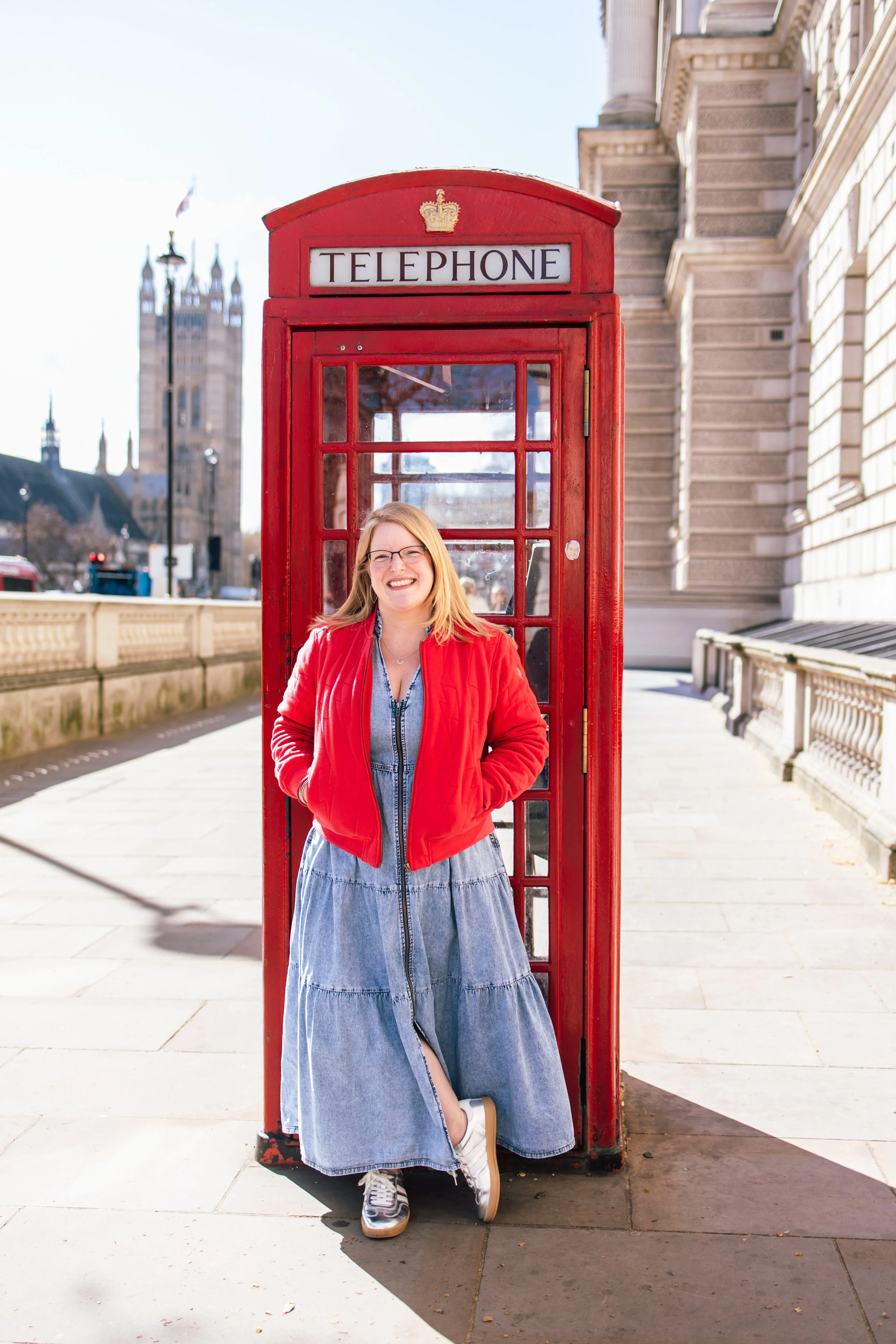Kirsty Hamilton London Photographer infront of red telephone box in Westminster