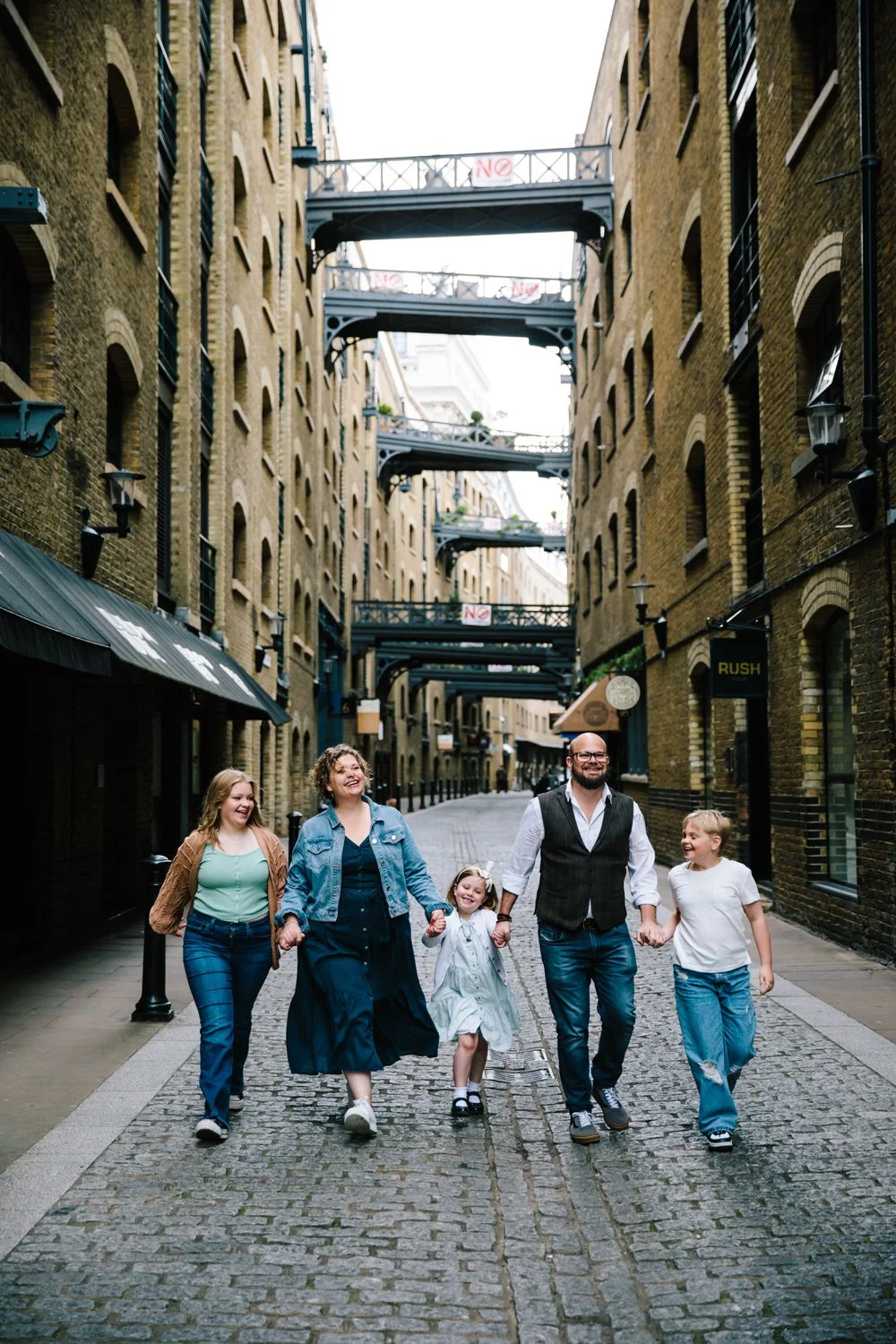 A fantastically fun family photoshoot around Tower Bridge | London Holiday Photographer
