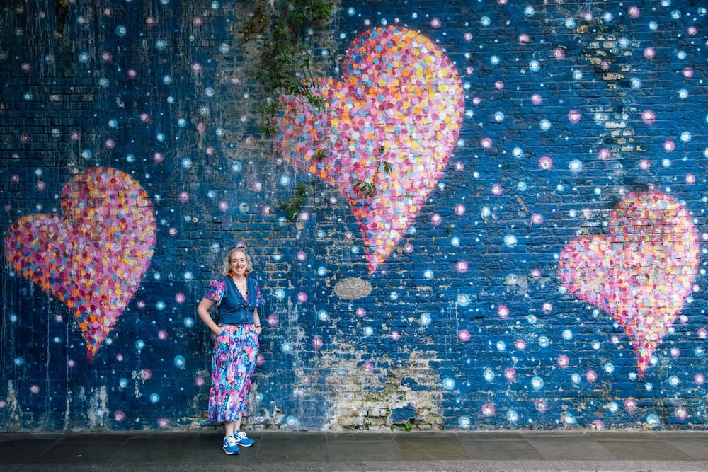 Borough market photoshoot by heart graffiti wall with a London Photographer