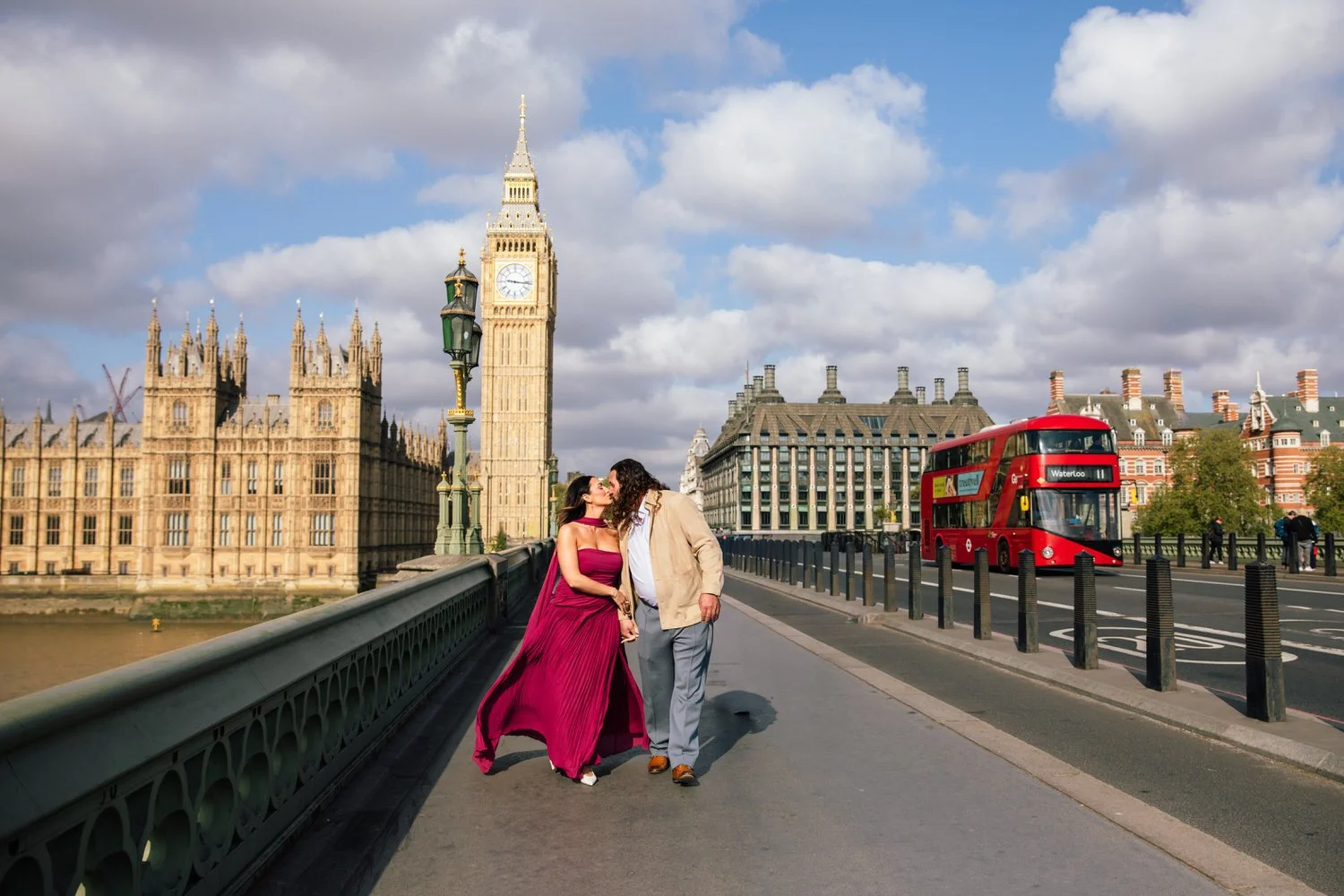 Couple kiss on Westminster Bridge for London Couples Photographer