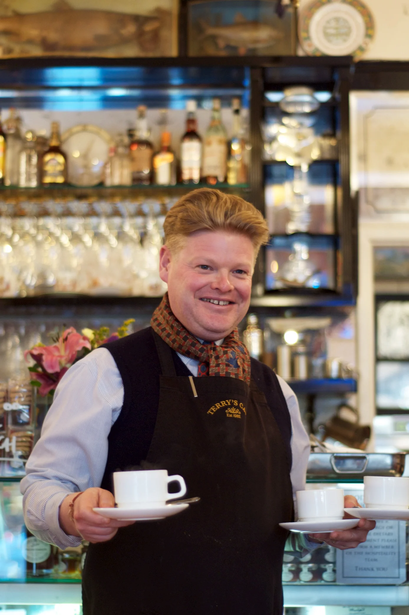 A cup of tea or three, served by the very dapper Austin, named in honour of Austin's of Peckham antique shop, which thereafter gave his canny father a discount.