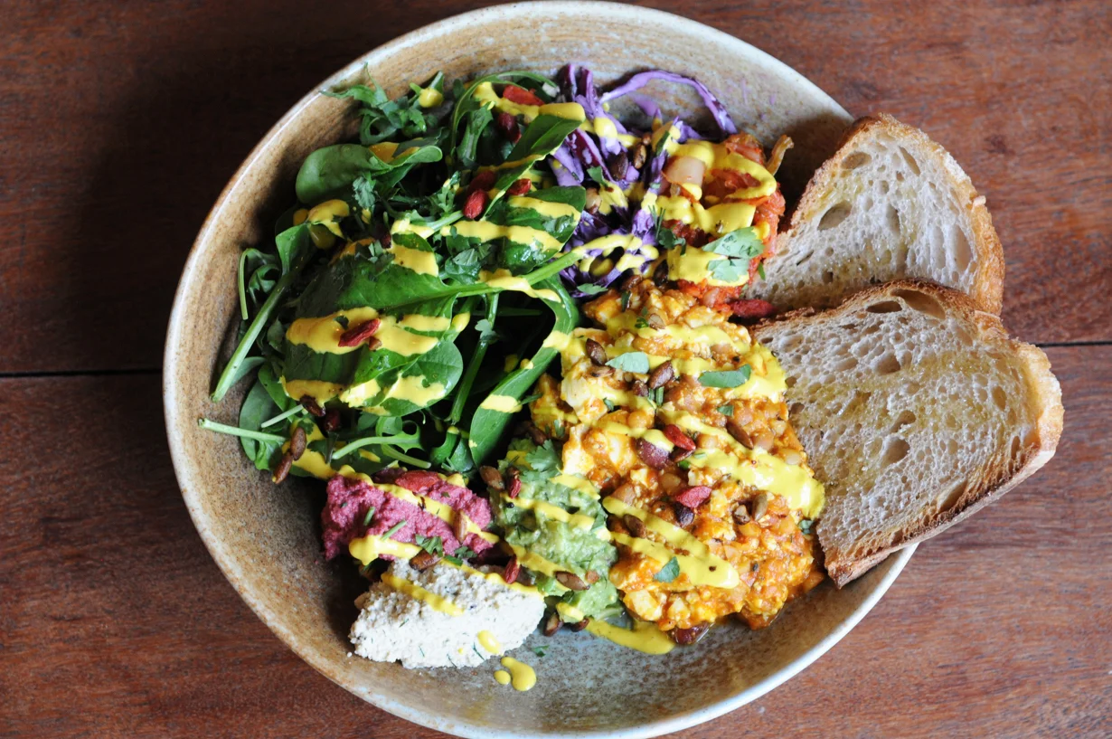 Rainbow bowl: organic tofu, fermented food, raw veg, condiments and seasonal greens. Nearly everything on this dazzling plate is made in-house.