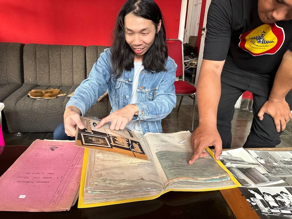  Gerry Apriryan looks at recording contracts, Lokananta Records, Surakarta 