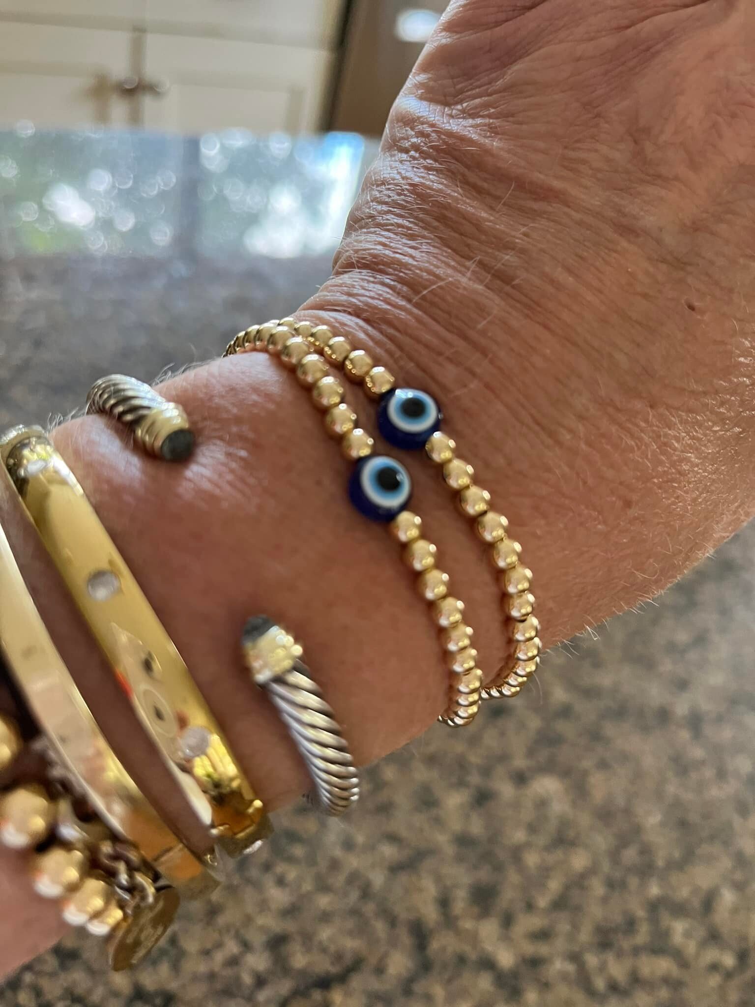 I love my evil eye bracelets! Check out my nieces new biz, www.dfbeaded.com perfect gift or to add to your wrist stack!! Thank you Dani Friedman! Just received in mail!!