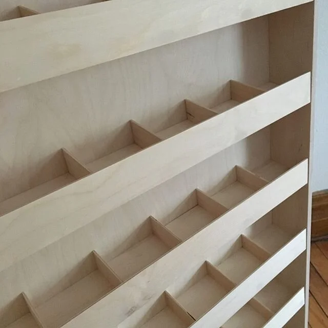 Portable seed display for Northern Seed Exchange. These two stands made from baltic birch have spaces for 96 different types and latch together for transport. Contact me if you are in need of some market displays, I love the challenge!
