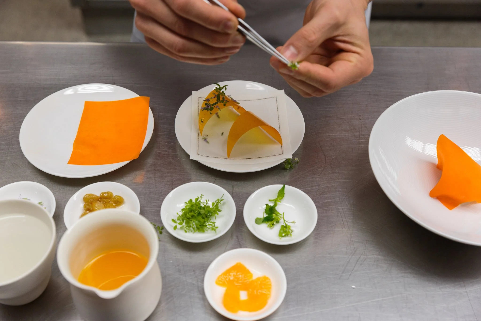 At Atera , a restaurant housed in the same building as Farm.One, there is a course in which the chef, tableside, dresses a dish with the herbs sourced from the basement.