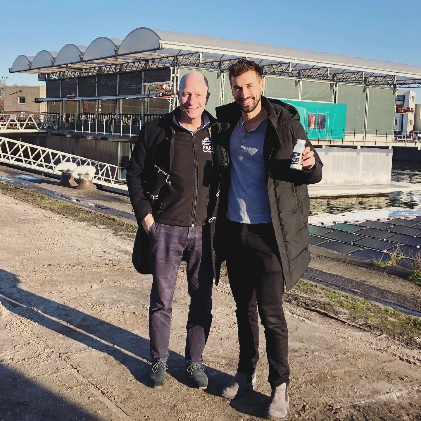 An image of Agritecture’s Founder &amp; CEO, Henry Gordon-Smith, and Peter Van Wingerden, CEO of the Floating Farm Rotterdam
