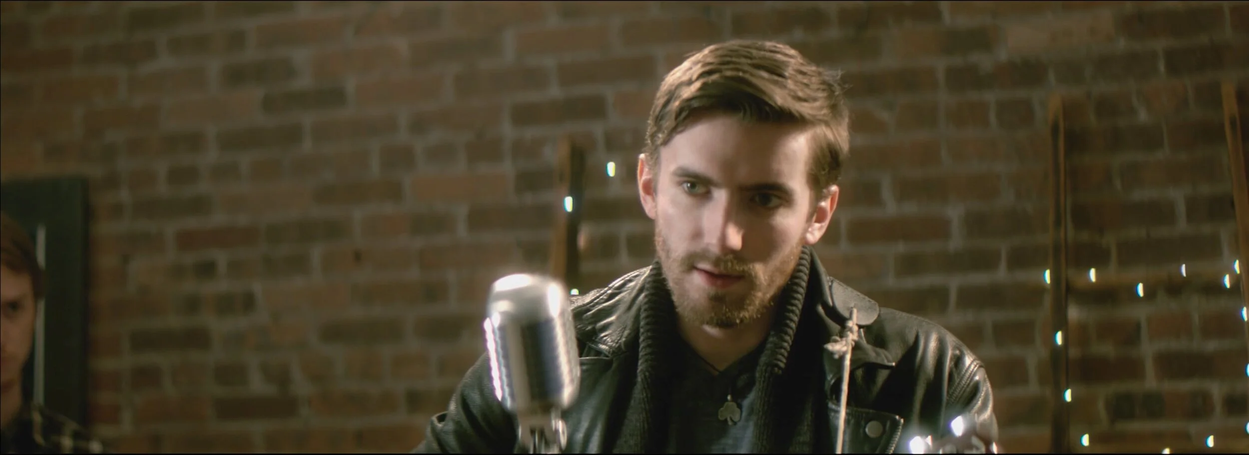 Still+of+Jesse+at+Mic.jpg