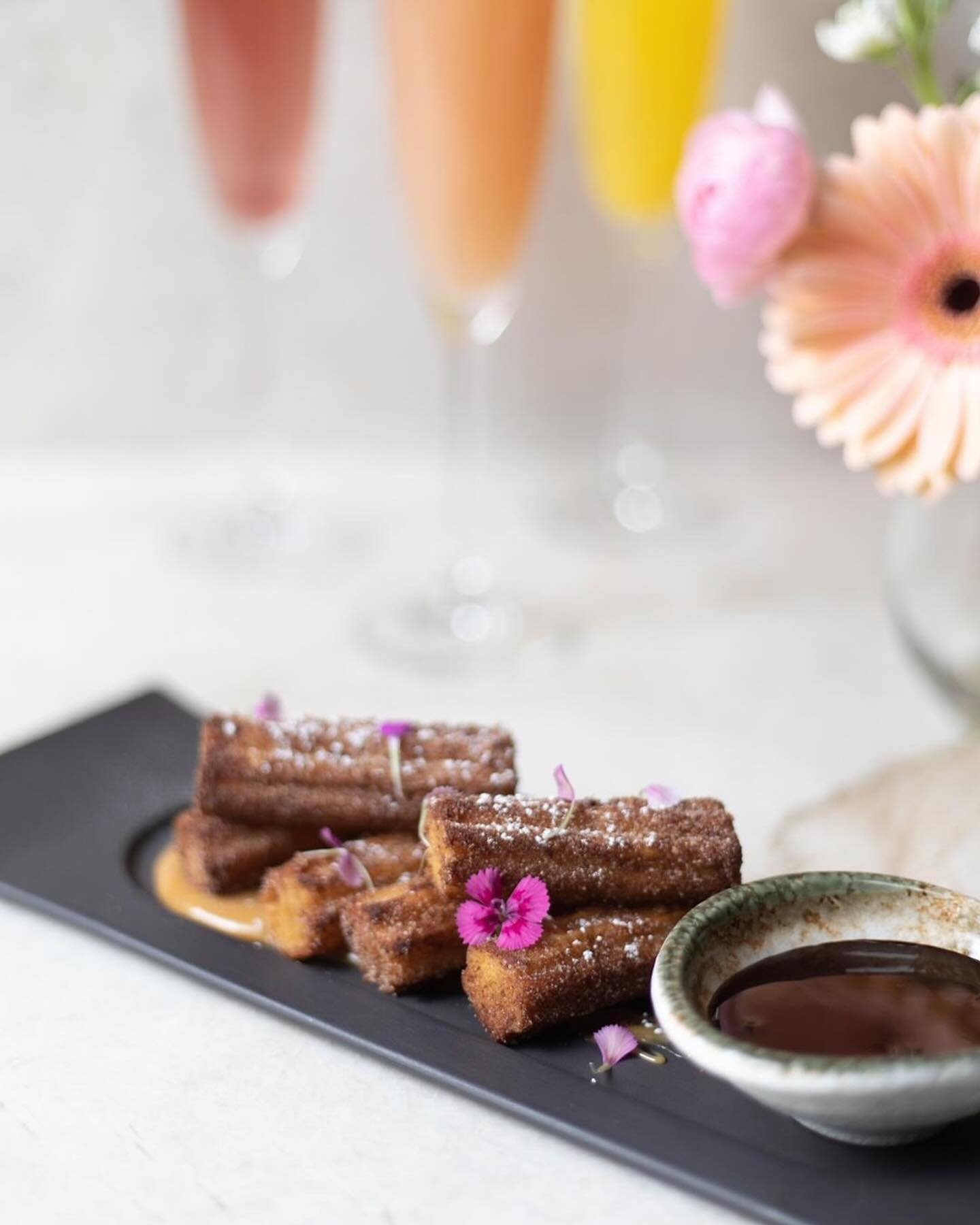 Celebrating Mom's the best way we know how... with a delicious bottomless brunch and flowers. Make a reservation to join us on Mother's Day 5/12. Link in bio.