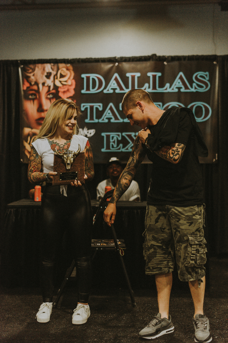Monica Zamora giving away First Place Black & Gray