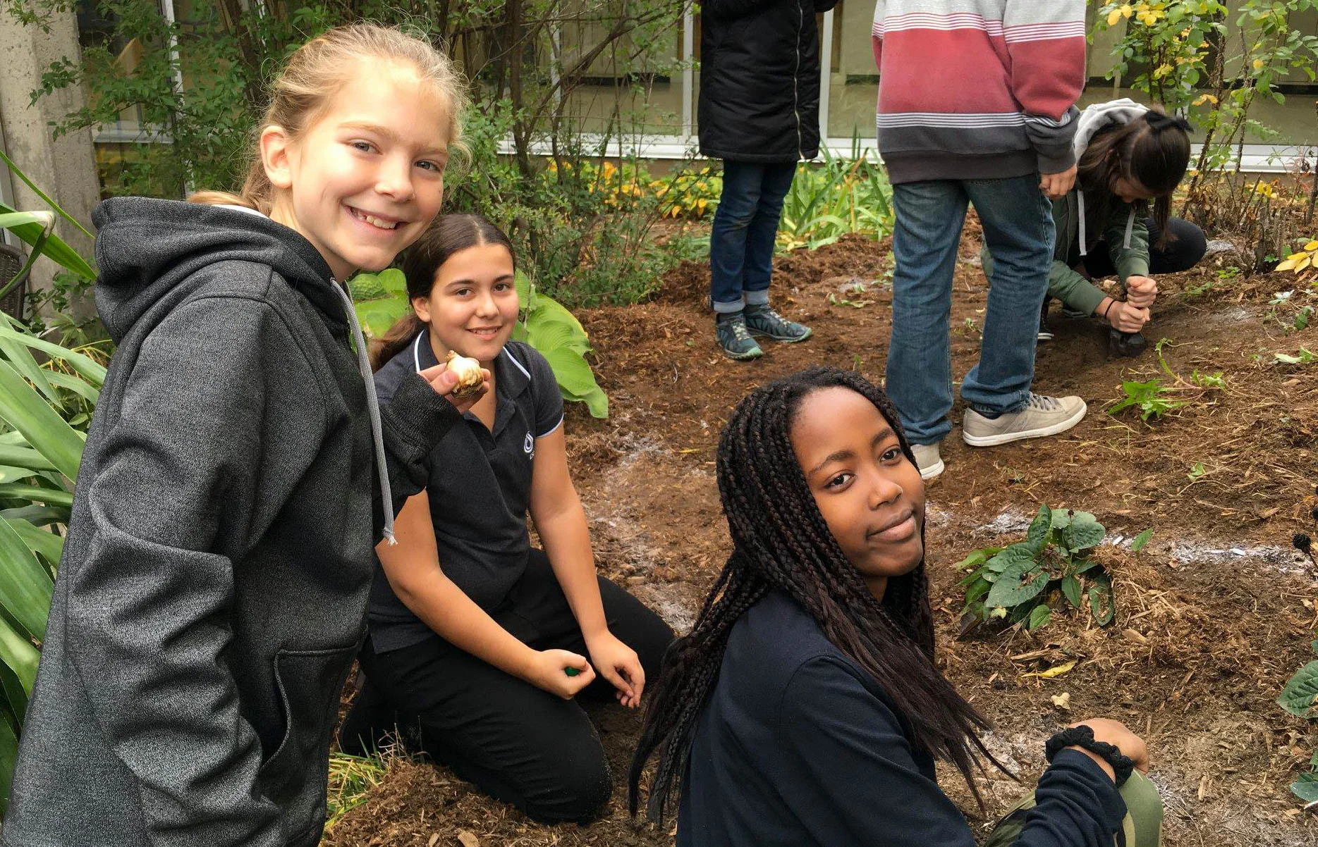 ESCJ Students Planting Bulbs.jpg