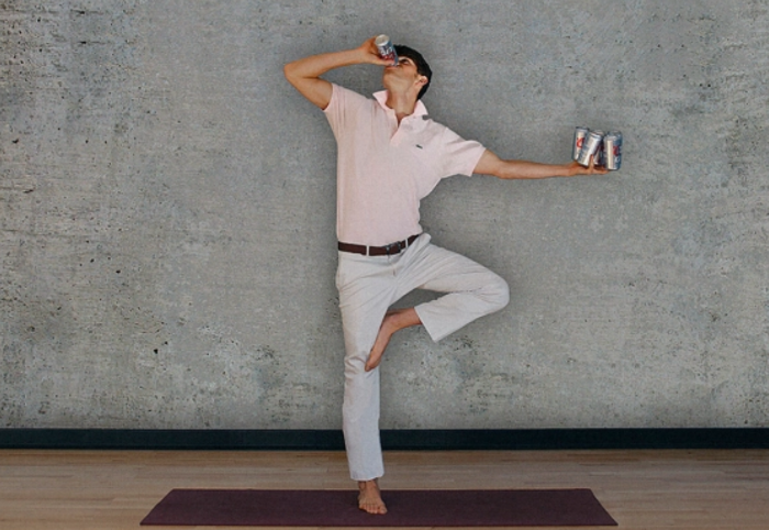 A broga practicing shotgunasana
