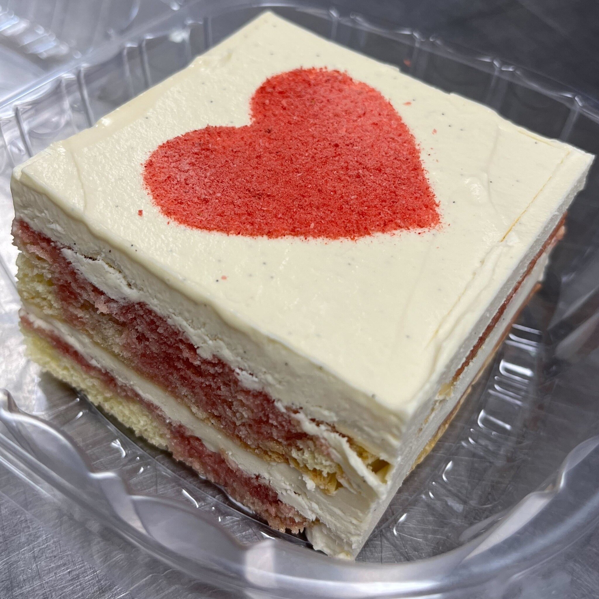 Valentine's Day is just around the corner, dear reader. Yes, THAT CORNER. 

Best get your honey (or yourself, self-care is important) a decadent hunk of our Strawberry Tiramisu. It is just like the classic delight you know and love, but strawberry is