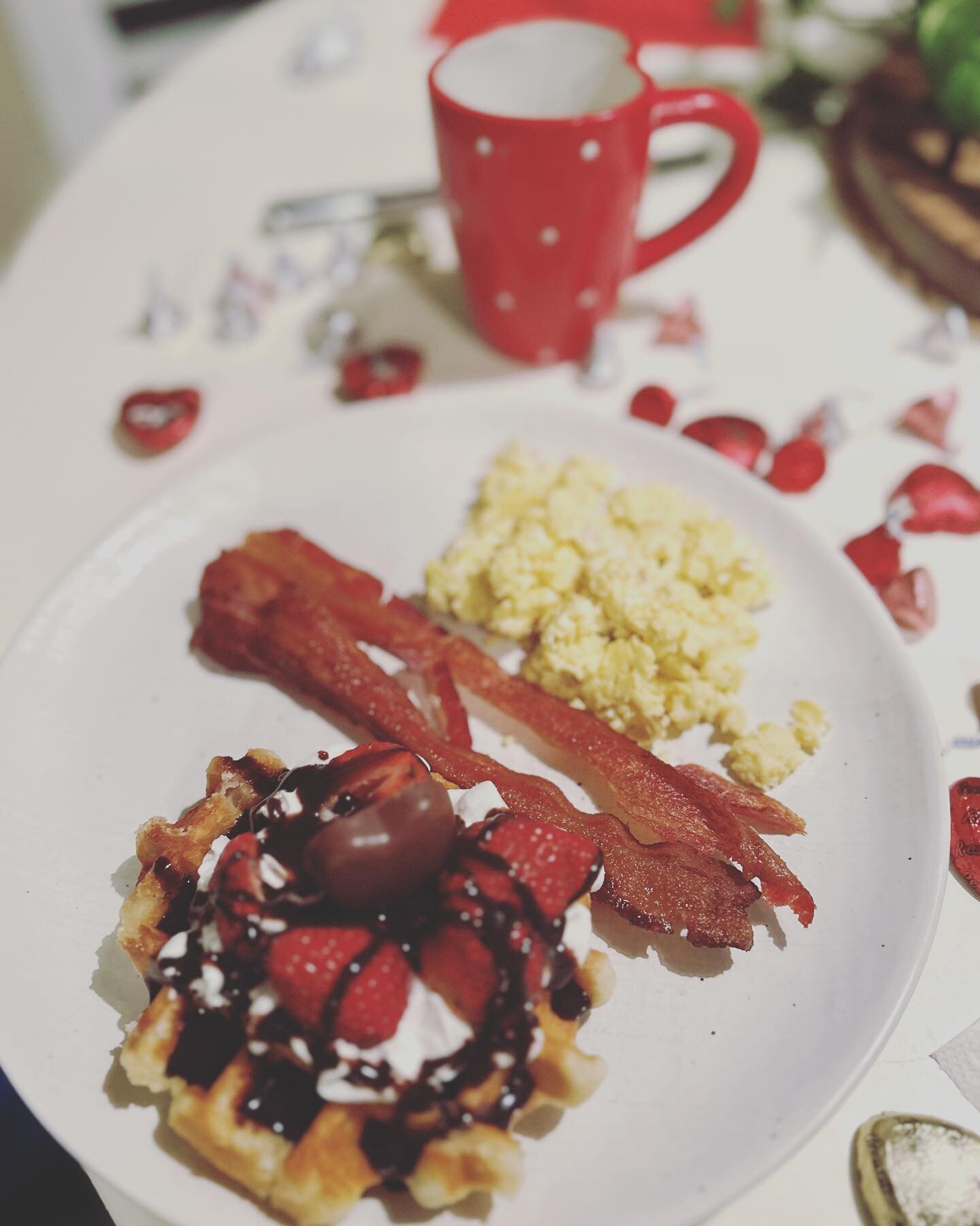 Some love Valentine&rsquo;s Day, others hate it, but bacon + waffles is always a good idea. This is how the Searcys celebrated.❤️
