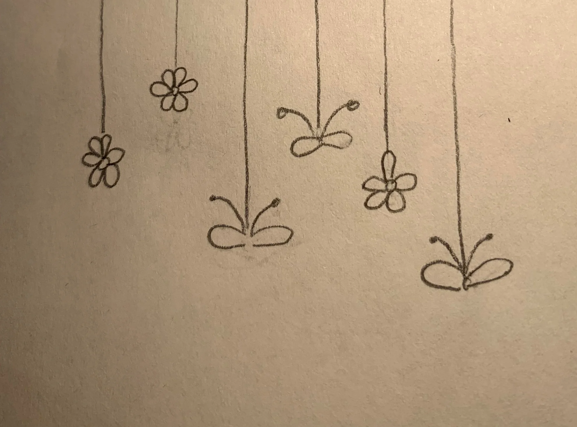 creature-like objects hanging down from ceiling
