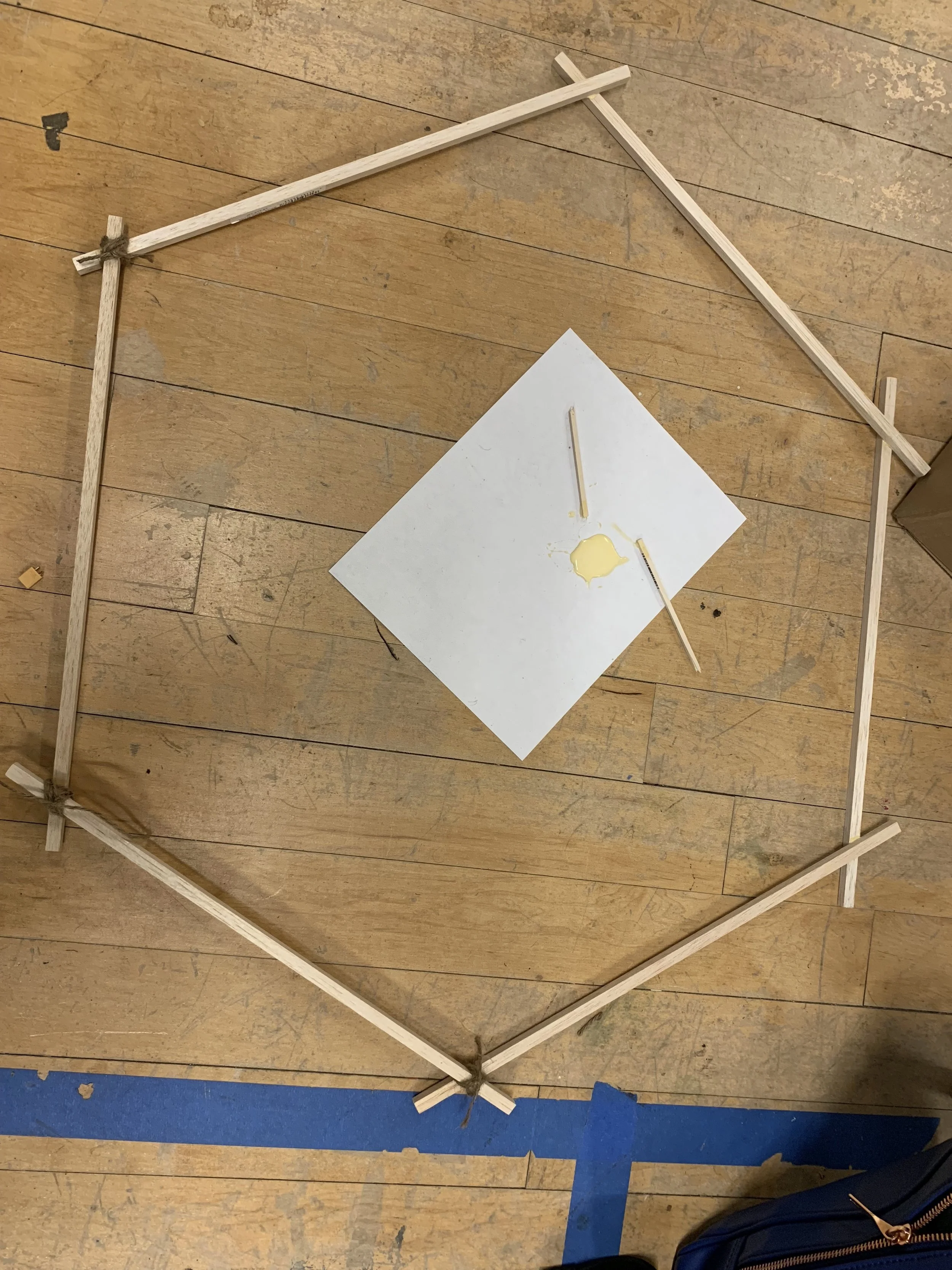 wood hexagon structure with wood glue and twine