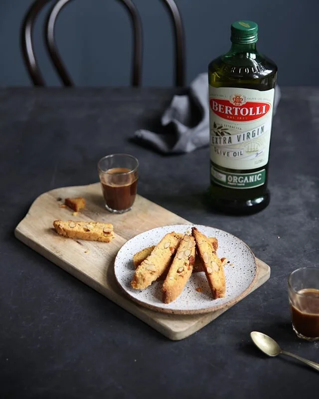 Olive oil in a biscuit? Why yes indeed. Peppery, spicy with a fruity kick, @bertollioliveoil_australia Olive Oil makes for a crunchy textured biscuit that&rsquo;s frankly got me eating way too many. I&rsquo;ve done the hard yards for you, got creative in the kitchen and tested this recipe quite a few times in a quest for the perfect biscuit to have with my morning coffee. Okay, I may have tested more than required, I warn you they&rsquo;re hard to resist. Loaded with almonds with a touch of fennel seeds and orange zest, rest assured they&rsquo;re a cinch to make. Make a batch to dunk in your coffee, or crumble over ice cream, you can thank (or curse) me later. #CreatedWithBertolli 
Olive Oil and Almond Biscotti with Fennel and Orange
300g plain flour
1 teaspoon salt
1 teaspoon baking powder
1 teaspoon fennel seeds
2/3 cup extra virgin olive oil
180g sugar
grated zest of 1 orange 
2 eggs
1 cup almonds, roughly chopped
In a medium bowl, whisk together flour, salt, and baking pow