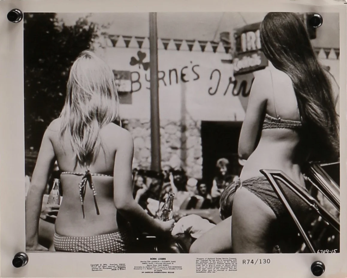 Whatever the outlaw biker picture, whether in bikinis or not, small town girls are always a willing audience for the hoodlums’ pranks