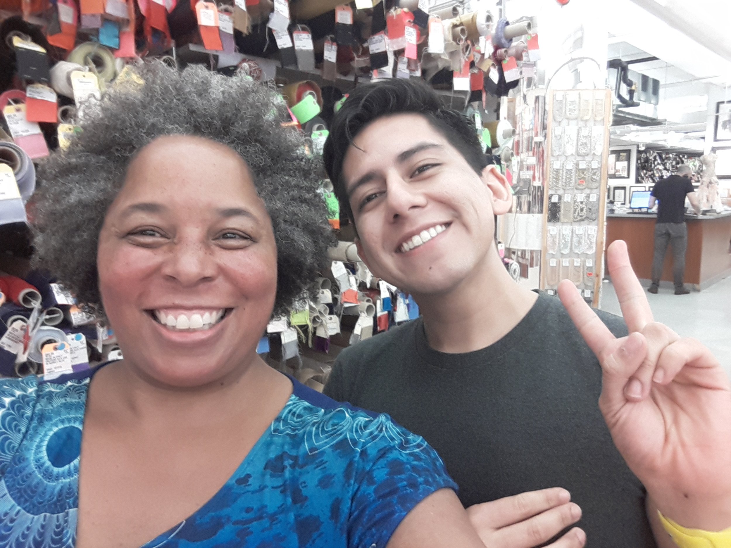 Buying costume fabric at BJ's Fabric Store with my fabulous consultant Jose!
