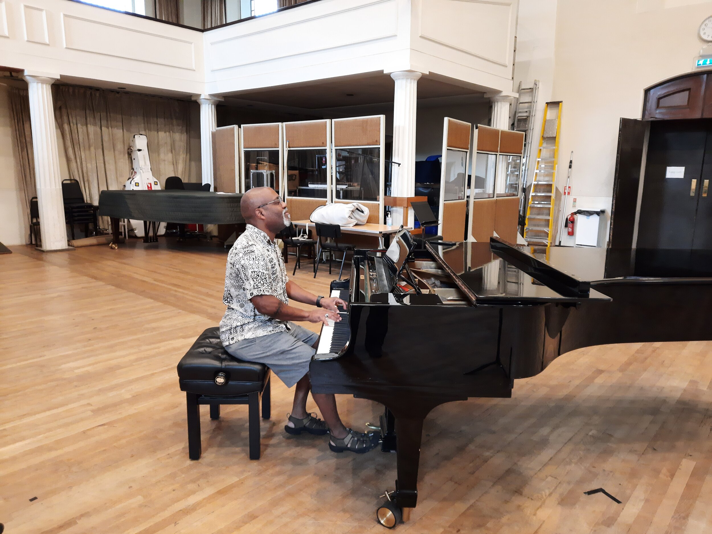 London rehearsals - Bill Eddins preparing the piano