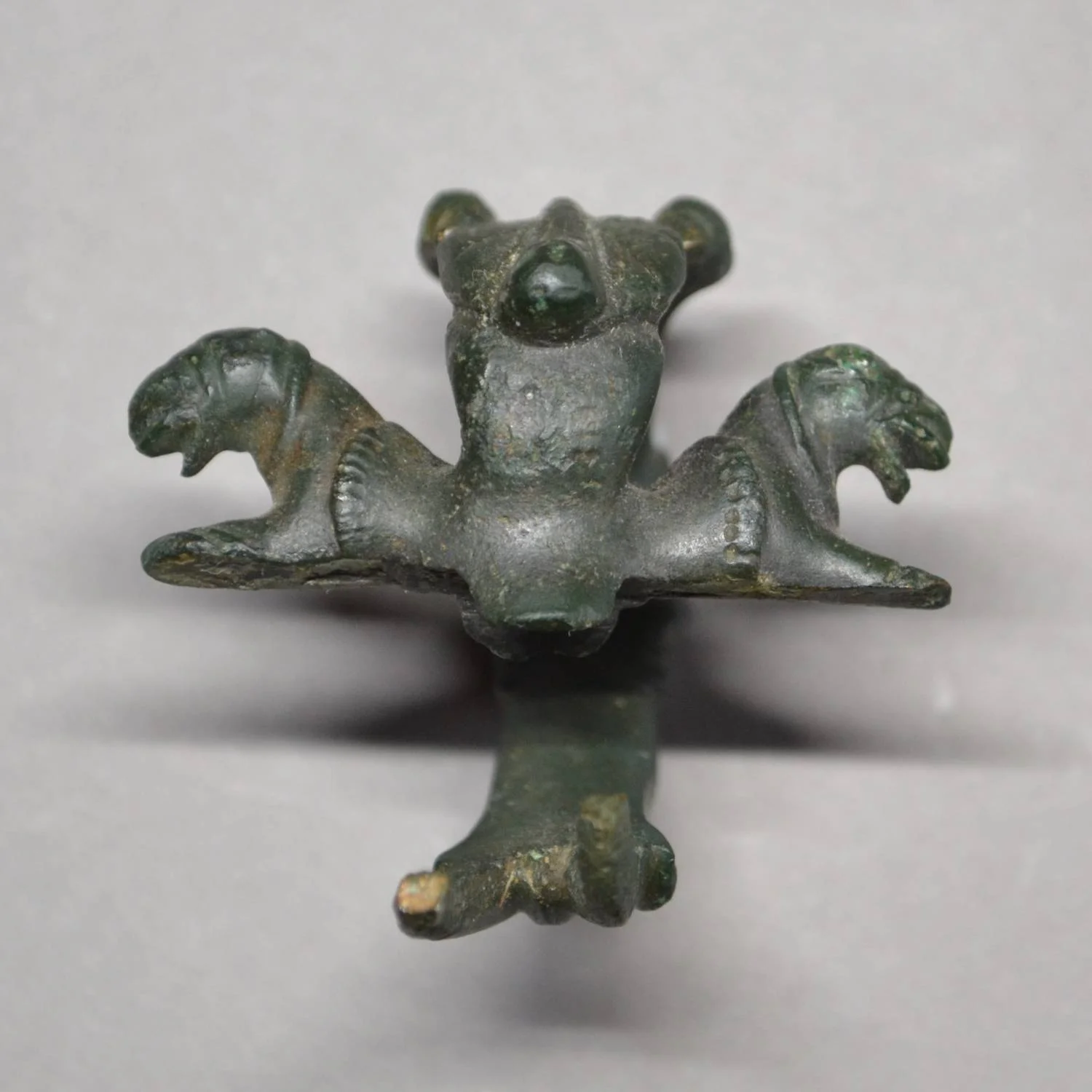 ROMAN BRONZE ZOOMORPHIC WINE JUG HANDLE.